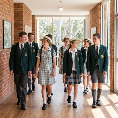 School group walking through a campus corridor